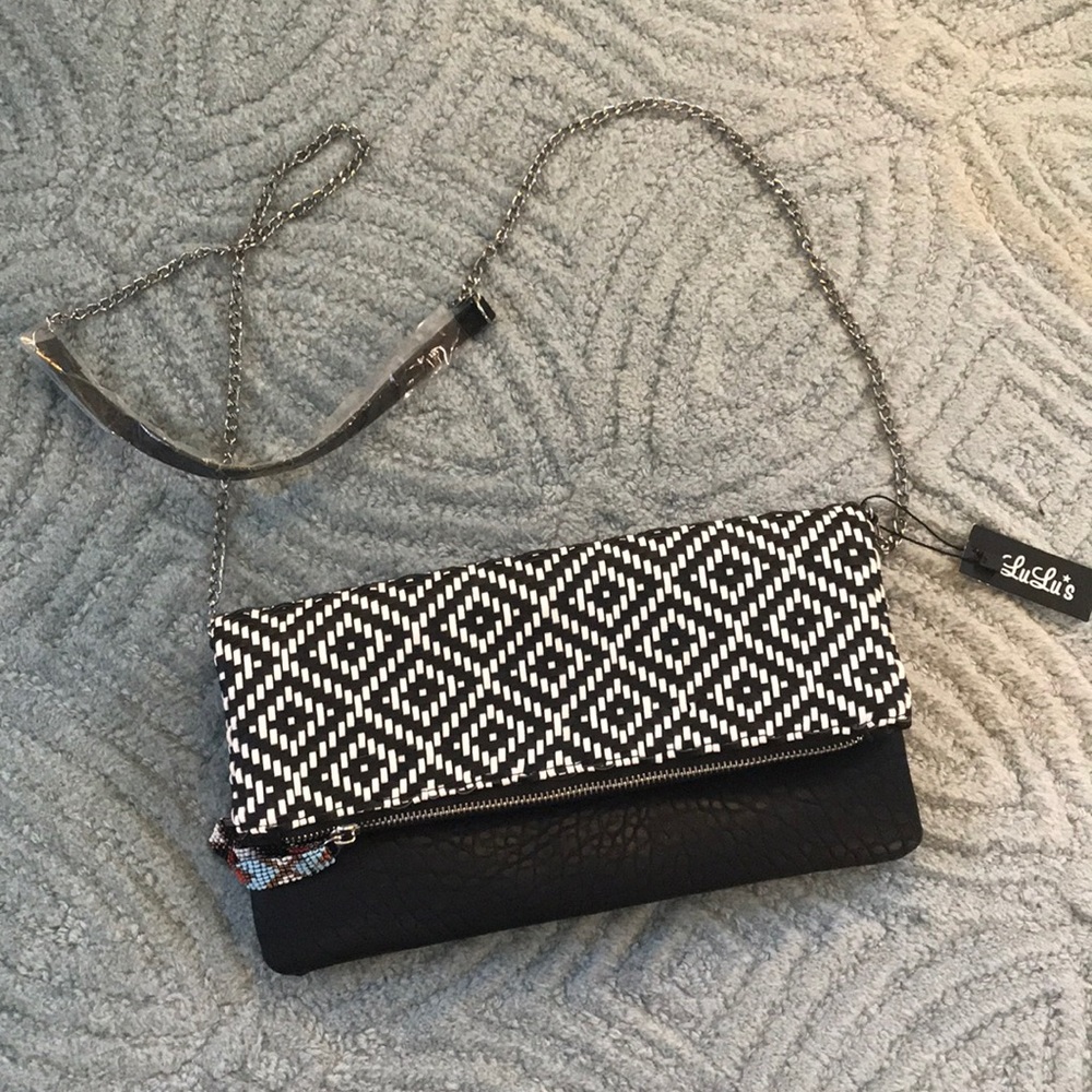Lulu’s satchel with detachable arm strap